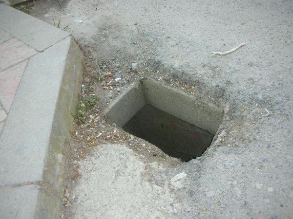 My favourite pothole in Tirana; it swallows young children and smaller midgets 