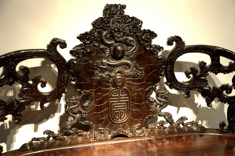 Throne chair with engraved lotus leaf and dragon design (detail)