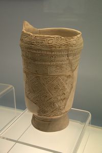 White pottery Zun (pot) with carved pattern