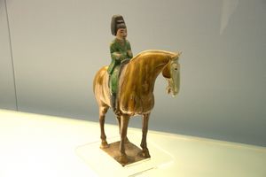 Polychrome-glazed pottery figurine of equestrian