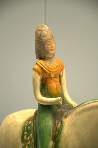 Polychrome-glazed pottery figurine of equestrienne