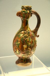Polychrome-glazed pottery ewer with a phoenix head