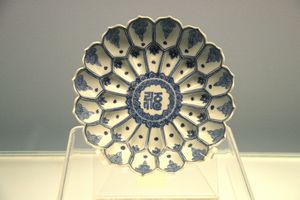 Underglaze blue lotus-shaped dish with sanskrit inscriptions