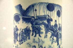 Blue and white brush pot with landscape and figures