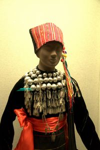 Jingpo ceremony attire with silver adornments