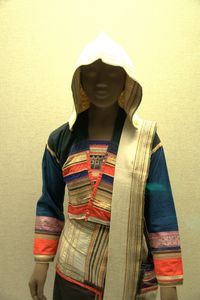 Jino women's outfit with woven stripes and trimming
