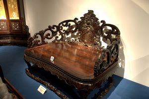 Throne chair with engraved lotus leaf and dragon design