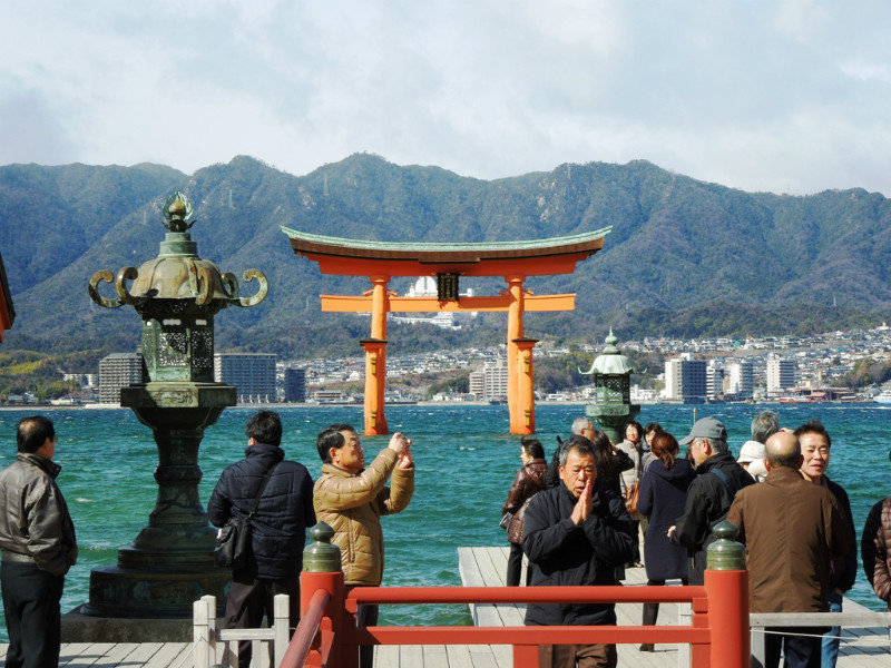 Tourists at the famous torii gate