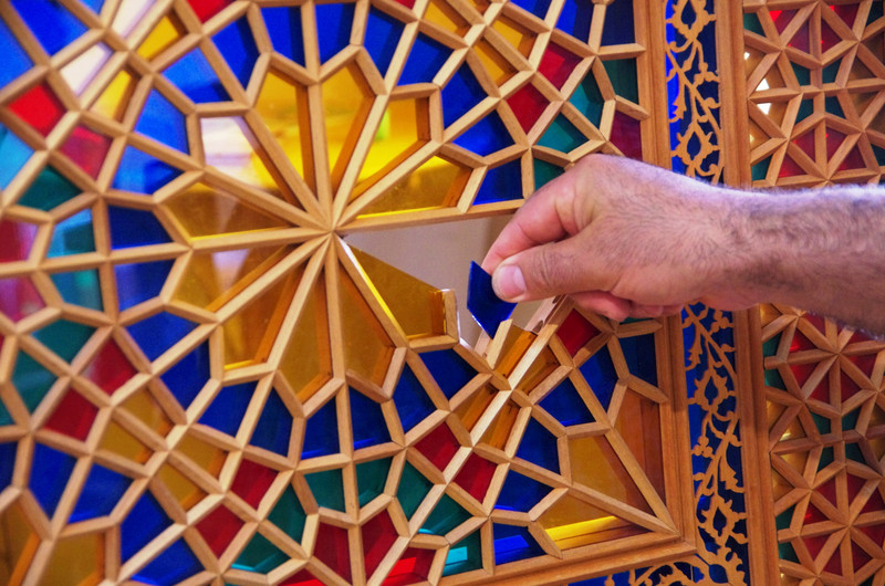 Putting together the stained glass windows in the Xan Sarayi (Khan's Palace)