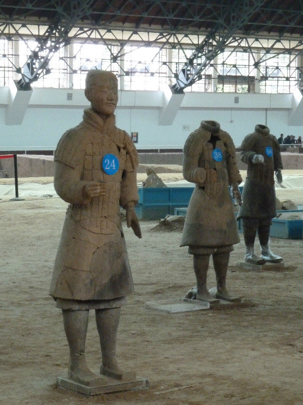 Terracotta soldiers being repaired