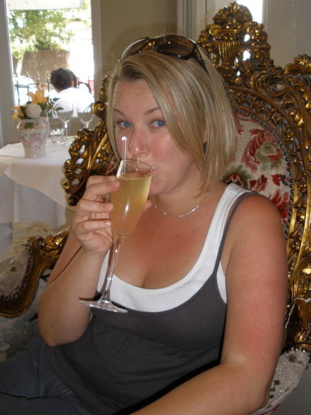 Sar Sips a Royal Champagne Cocktail