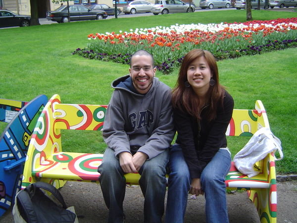 Sitting at one of the colourful benches w Mig