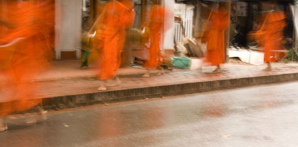 Buddhist monks receiving alms