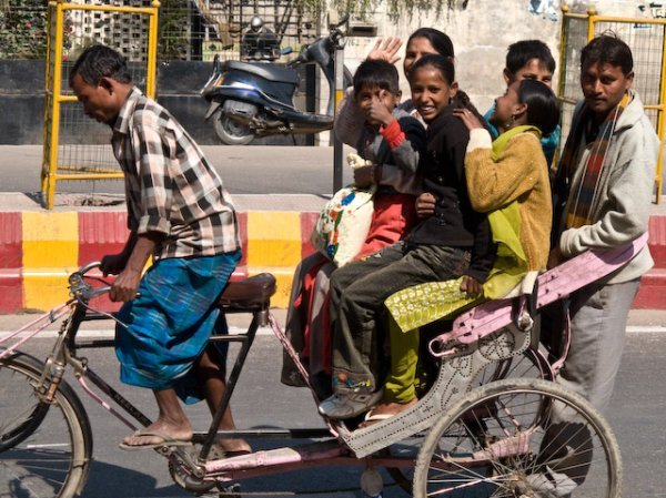 How many people in a rickshaw?