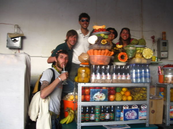 In the market - Simone, Ed, Paymon, the fruit shake lady and me