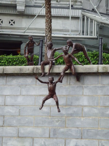 Jumping boy statue