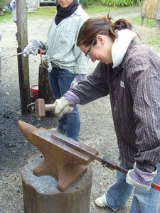 Forging....or bashing the hot steel into a knife like shape!