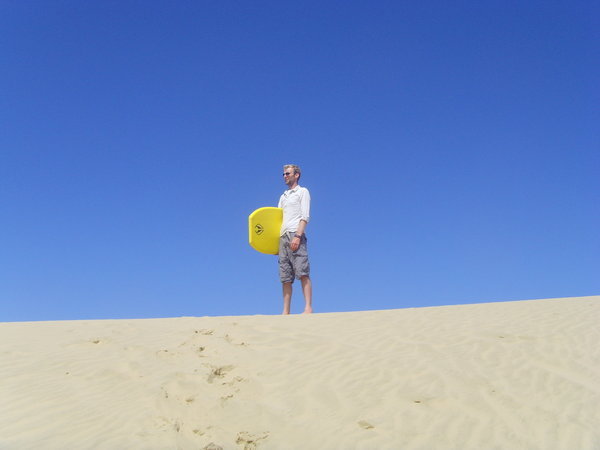 Ian at the top of the sand dune