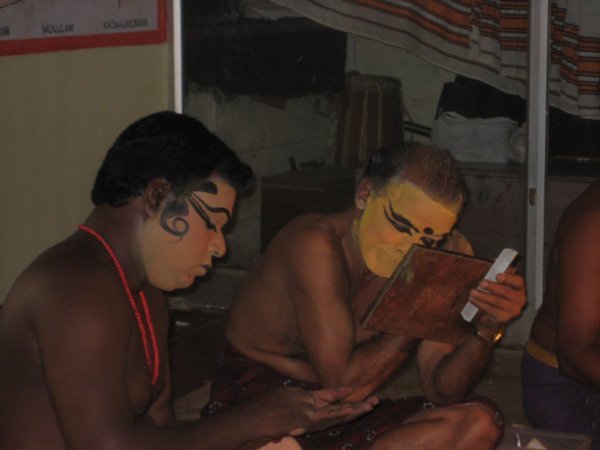 Watching Kathakali dancers apply their make-up ...