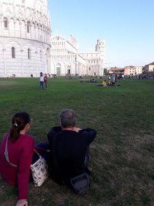 Relaxing by the Baptistry near the Leaning Tower of Pisa