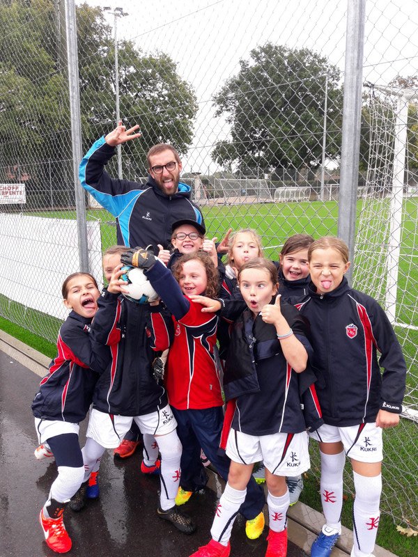 Emma's first and possibly last football match for school, it rained all day!