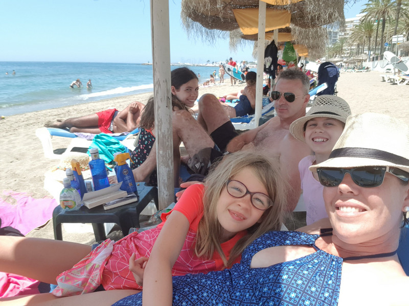 Enjoying the loungers on Marbella beach