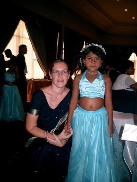 Miriam in a sari, with one of the flower girls