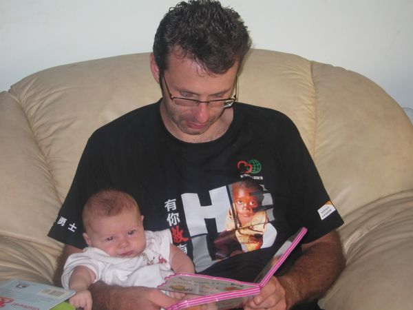 Reading a book with Dad.