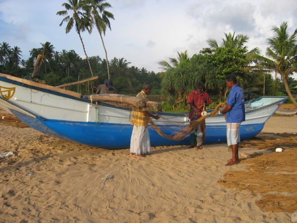 Fishermen with new equipment provided under the livelihoods program.