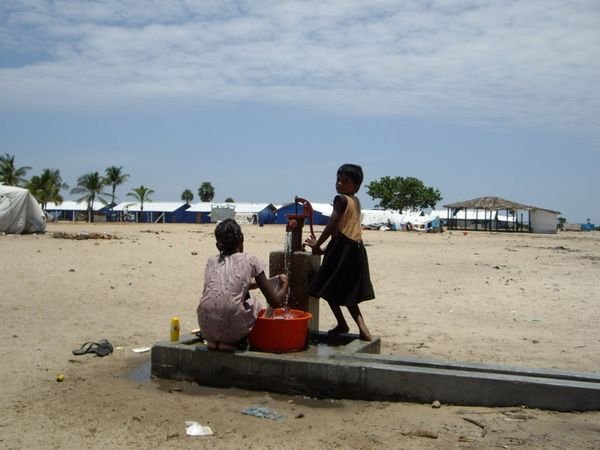 Hand pump well at Refugee camp.