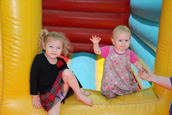 The girls testing out the bouncy castle