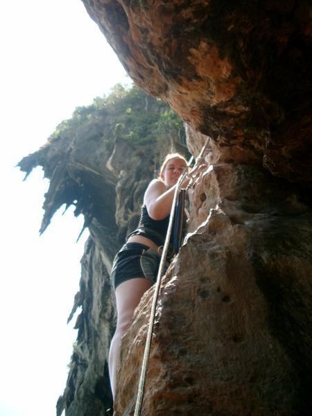 Miriam climbing.