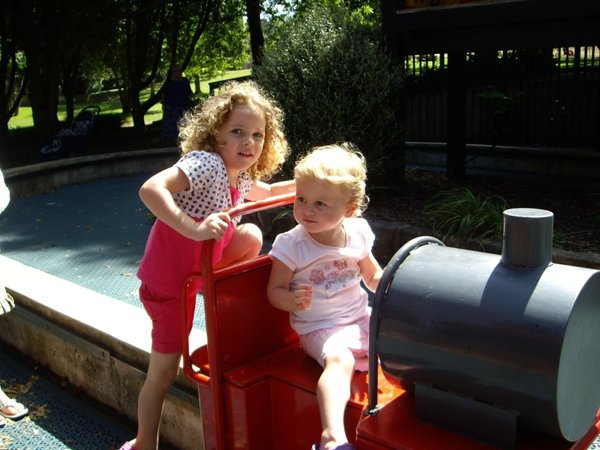 The girls enjoying the train at One Tree Hill playground