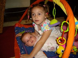 Charlotte playing with Emma