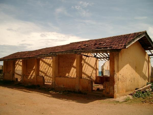 This school is still functioning in the classrooms shown.