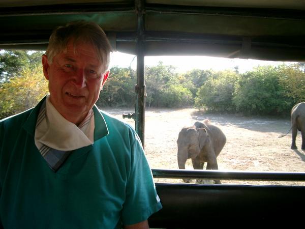 Dad with a wild elephant.