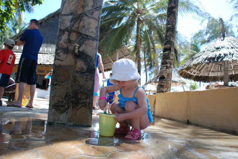 Emma playing with the sand/water combo