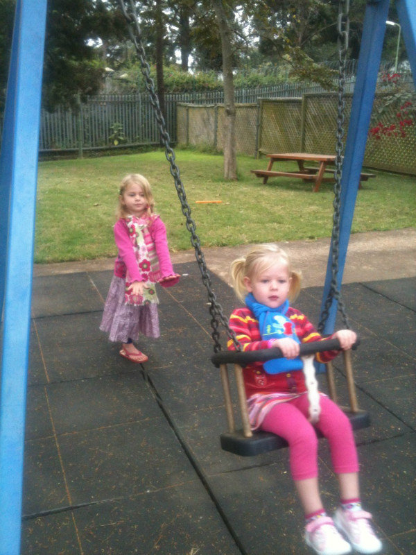 Emma in the swing at Gitanga, Hayley pushing, its a little scary that all 3 of my kids have grown up around this swing :)