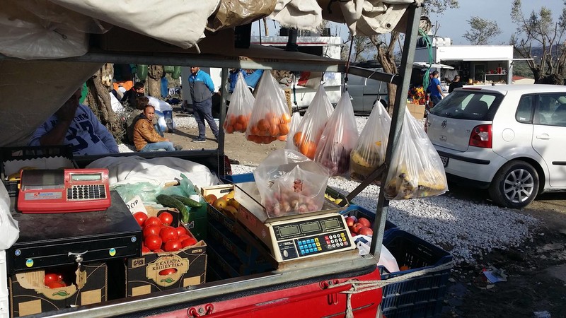 Local traders set up shops at the Moria registration centre, where refugees can buy food. It is win-win for the refugees and the Greek economy.