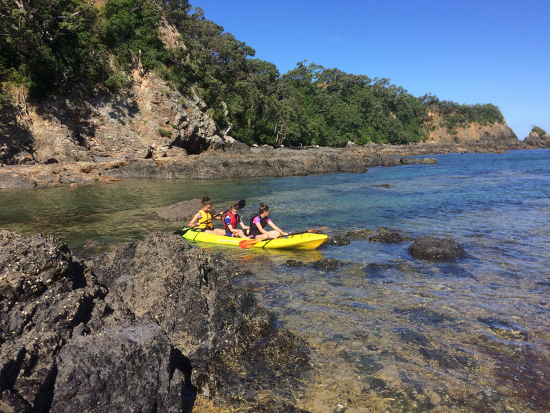 Cuzzies kayaking near the rock pools