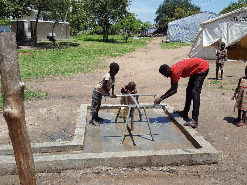 Newly installed pipe water systems and water tap stand for refugees