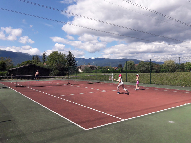Muzz, E and C playing tennis