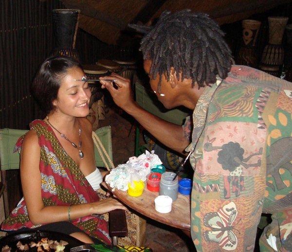 Getting my face painted at The Boma