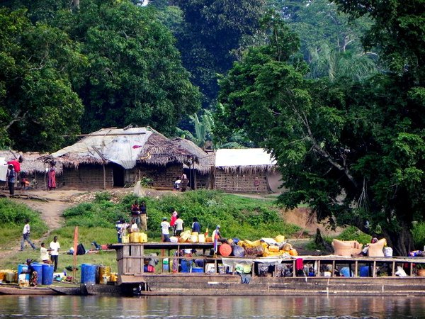 Boat unloading goods at Eboko village