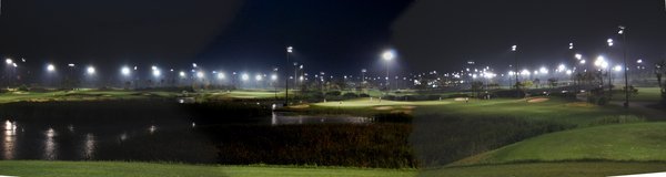 small pan of a par 3 under the lights