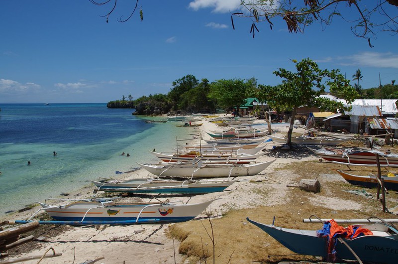 a village along the coast of malapascua island
