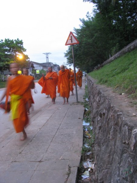 Monks collecting their daily Alms