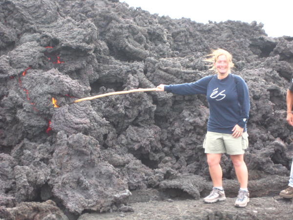 Lauryn poking a stick into the lava too!