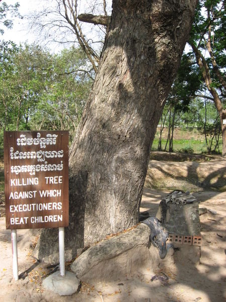 Killing Tree - "Killing tree against which executioners beat children." 