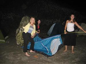 Setting up a tent which you have never seen before, in the dark, while drinking.... it's not so easy!